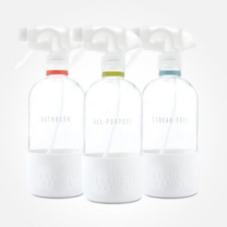three glass spray bottles