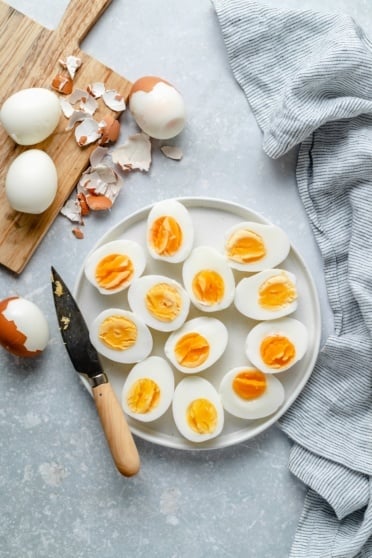 perfect hard boiled eggs sliced on a plate