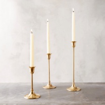 three gold candles