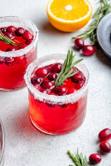 holiday punch in a glass with cranberries