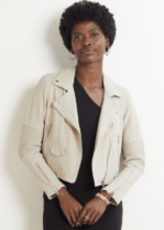 woman in a tan jacket