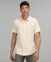 man in a yellow short sleeve shirt