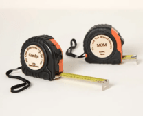 two engraved tape measures