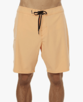 man in orange board shorts