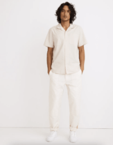 man in white pants