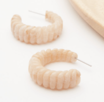 pair of light pink earrings
