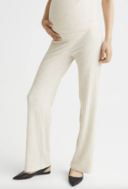woman in white maternity pants