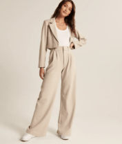 woman in a tan suit