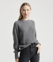 woman in a grey sweater