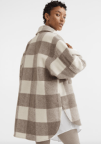 woman in a plaid jacket