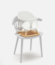 kids booster seat on a chair