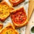 pizza tarts on a cutting board