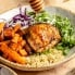 drizzling hot honey on hot honey chicken bowls