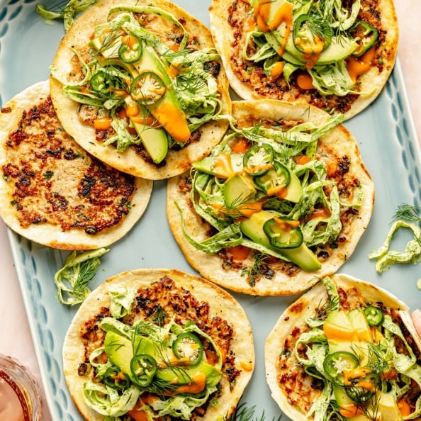 smashed buffalo chicken tacos on a platter