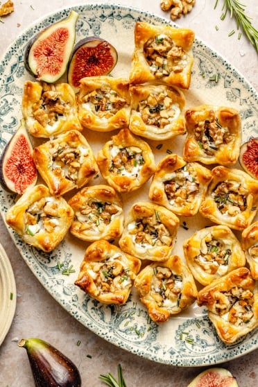 goat cheese puff pastry bites on a platter