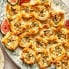 goat cheese puff pastry bites on a platter