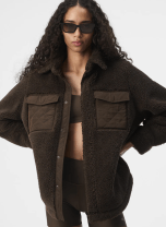 woman in a brown jacket