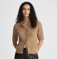 woman in a short sleeved cardigan