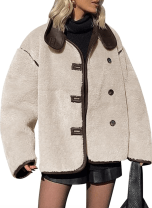 woman in a cream faux fur jacket