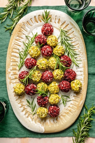 holiday cheese truffles in the shape of a Christmas tree on a platter