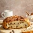 homemade cinnamon raisin bread sliced on a cutting board