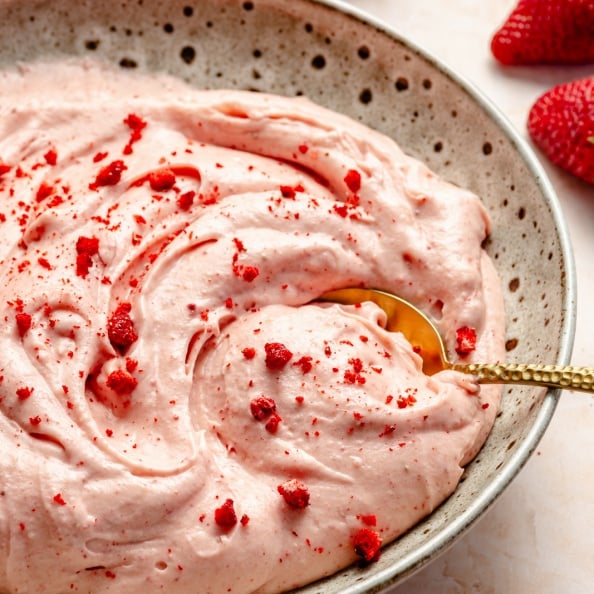 strawberry cream cheese frosting in a bowl