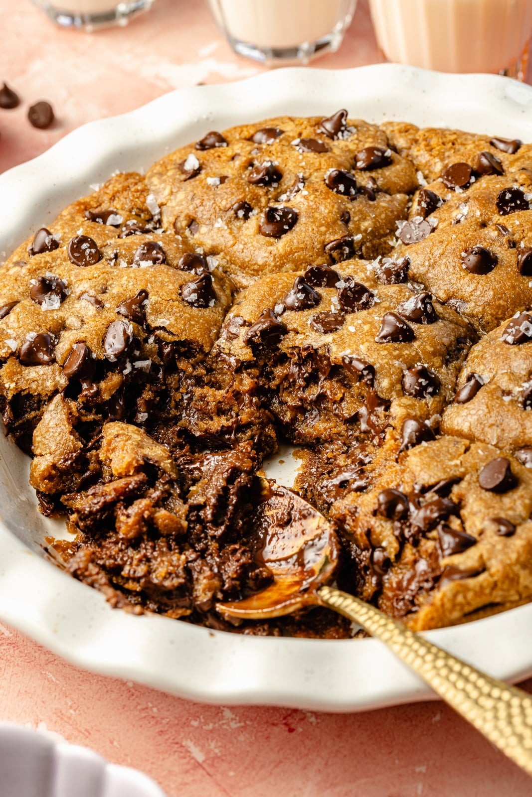 pan of scoopable chocolate chip cookies with a spoon scooping