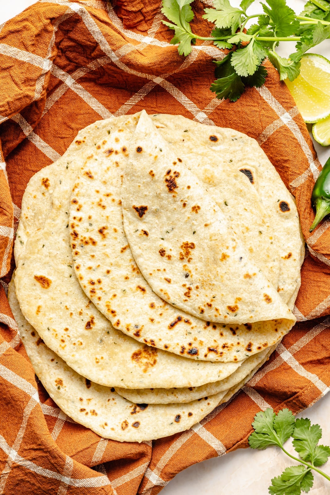 whole grain tortillas on an orange towel