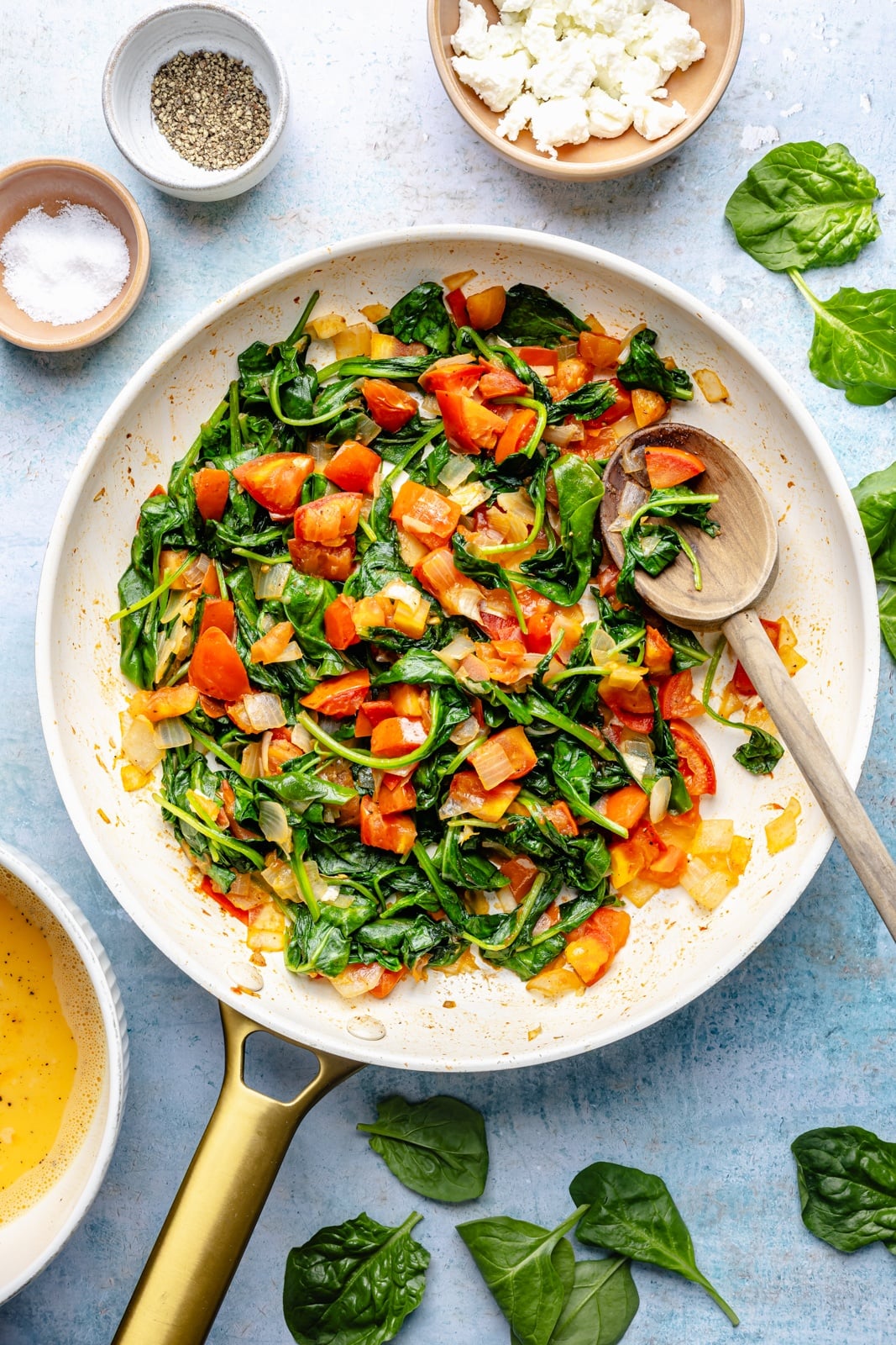 cooking veggies for a spinach and goat cheese quiche