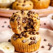 two peanut butter banana muffins in a stack