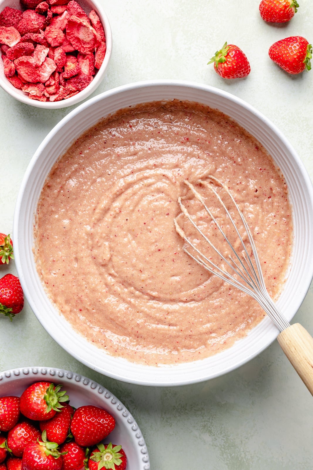 mixing batter for a gluten-free strawberry snacking cake
