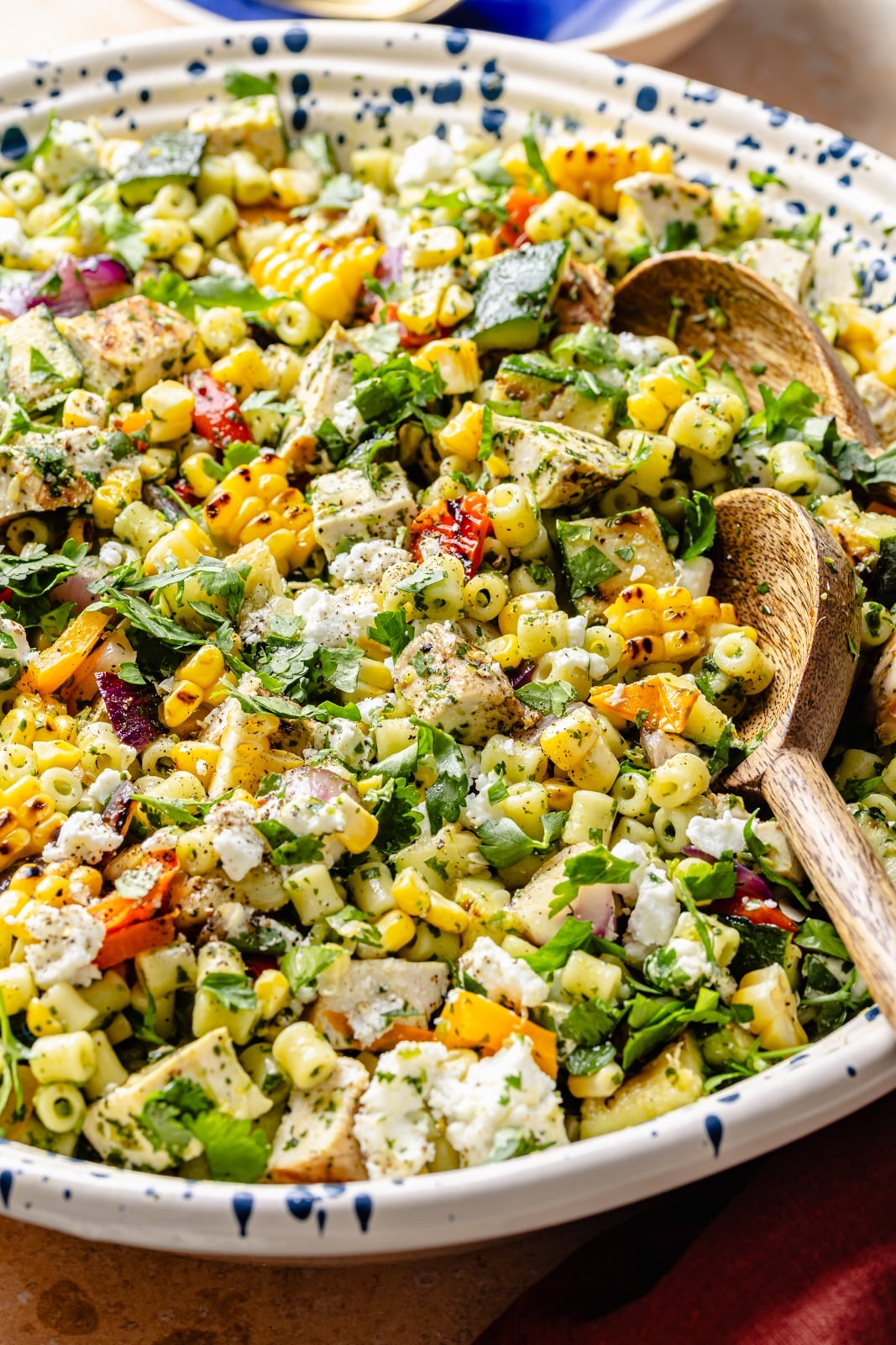 grilled chicken chimichurri pasta salad with veggies in a bowl