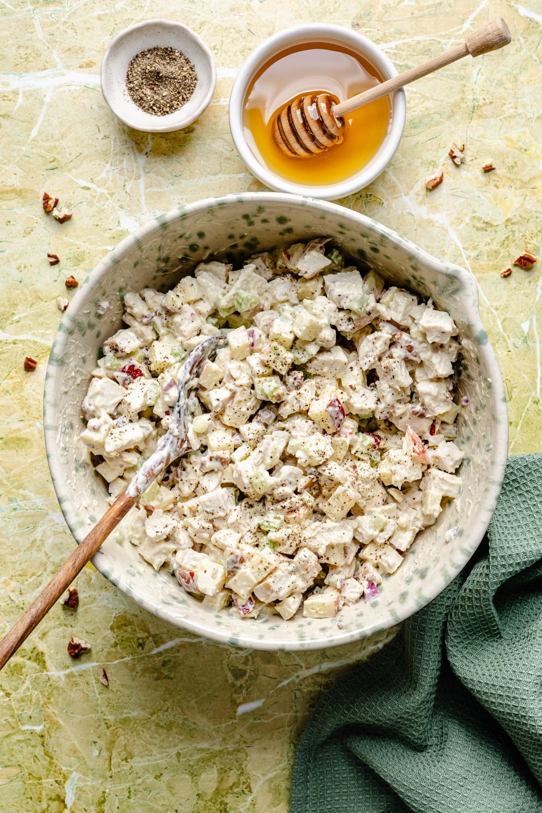 Fresh, high-protein honey mustard chicken salad mixed with a flavorful Greek yogurt-based dressing, juicy honeycrisp apples, and plenty of crunch from celery and nuts. Scoop it with crackers or enjoy it as a sandwich or wrap for the perfect no cook lunch that's ready in 15 minutes! healthy honey mustard chicken salad in a bowl