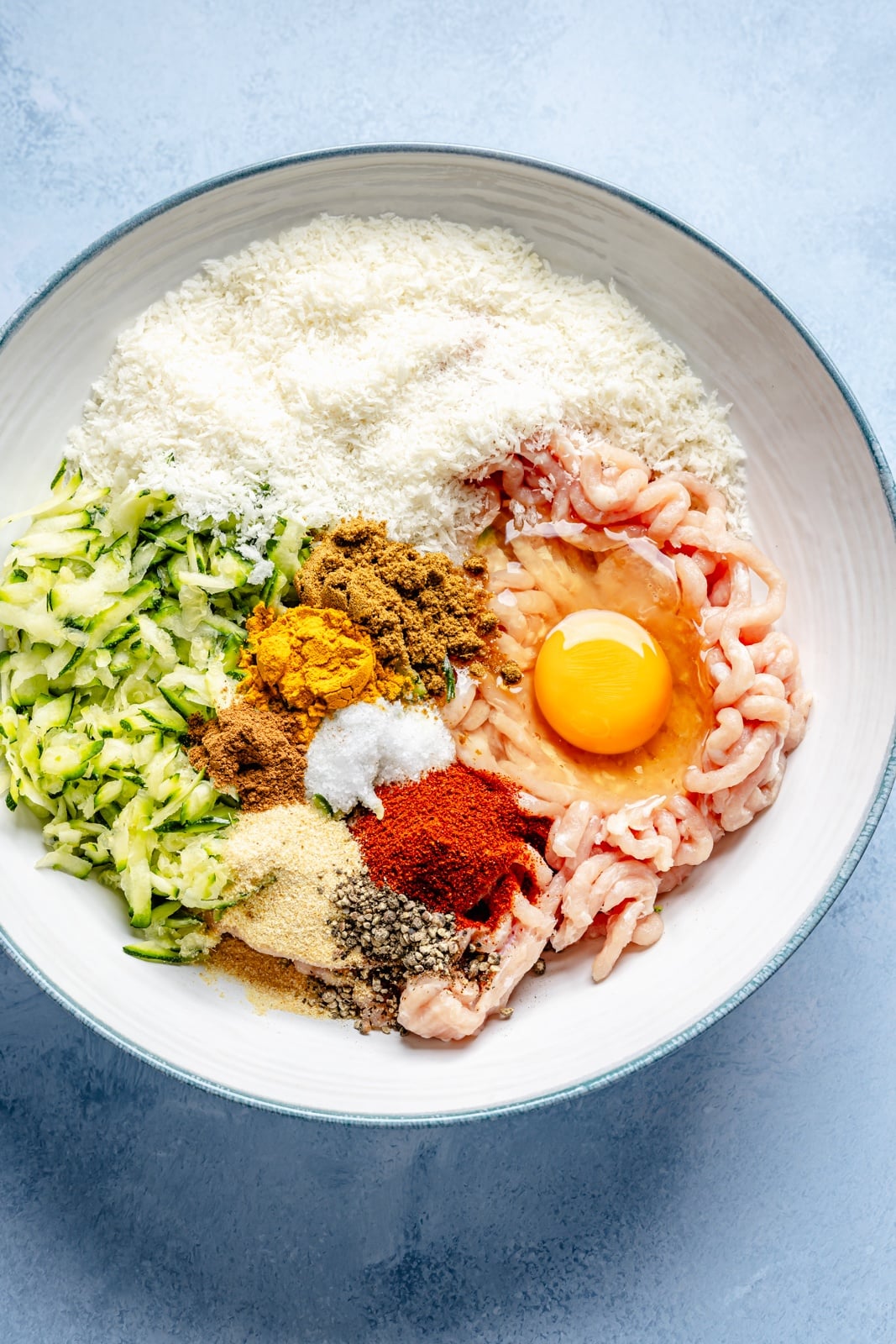 ingredients for chicken shawarma meatballs in a bowl