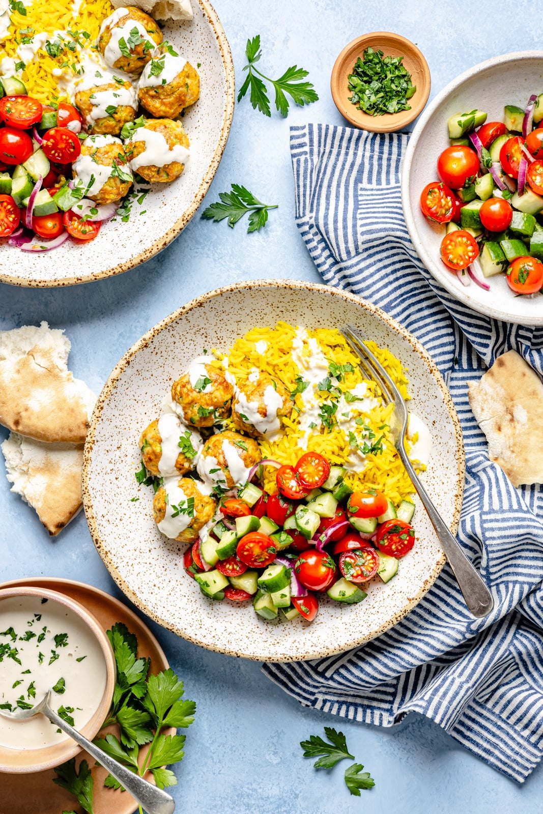 chicken shawarma meatballs bowls with rice and salad