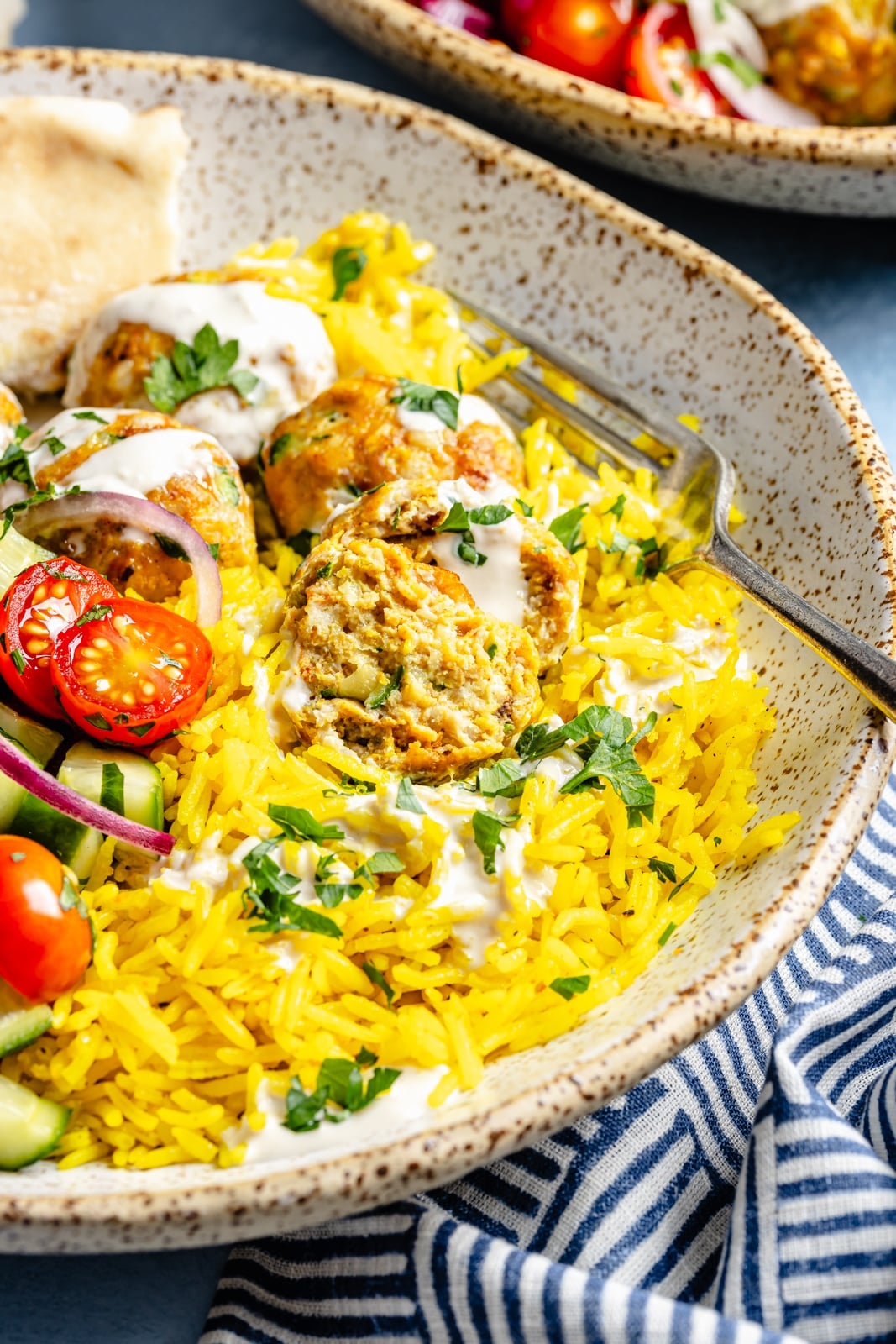 chicken shawarma meatball bowl with rice and salad