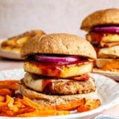 BBQ bacon turkey burger on a plate with sweet potato fries