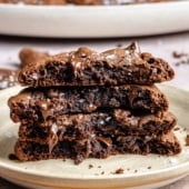 chocolate olive oil cookies in a stack on a plate