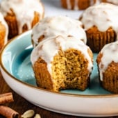 butternut squash muffin on a plate with a bite taken out
